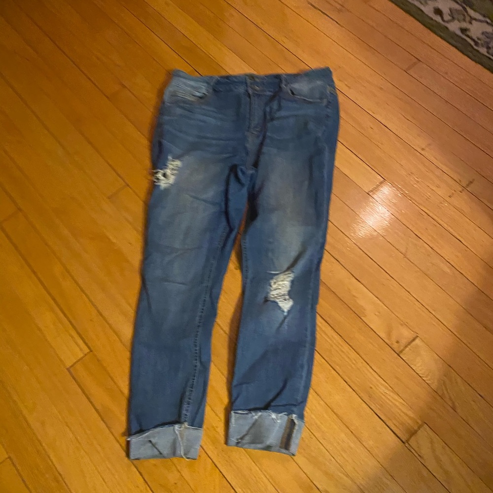 Distressed blue jeans